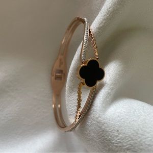 Gold bracelet with black charm club ♣️